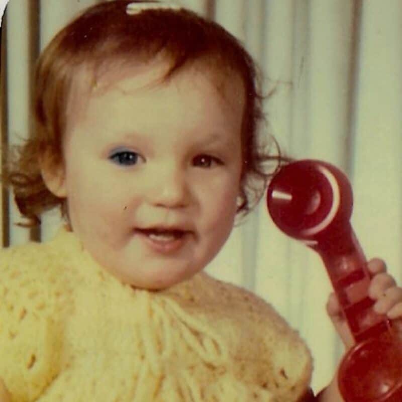 retro baby with phone